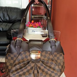Pre-owned Louis Vuitton 2009 Damier Ebene Sistina Pm Handbag In Brown