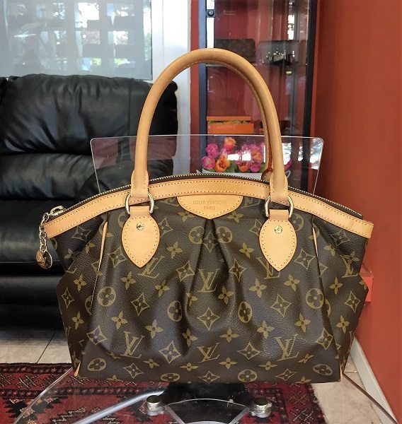 a LOUIS VUITTON 'Tivoli PM' bag. - Bukowskis